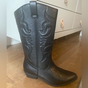 Tall cowboy boots. Brand is Dream Pairs from Amazon. Very comfortable, size 9.